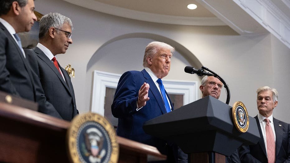 WASHINGTON, DC - MAY 12: President Donald Trump, joined by FDA Commissioner Martin Makary, National Institutes of Health (NIH) Director Jay Bhattacharya, Health and Human Services Secretary Robert F. Kennedy Jr., and Administrator for the Centers for Medicare & Medicaid Services, Dr. Mehmet Oz, speaks inside the Roosevelt Room on May 12, 2025 at the White House in Washington. Trump signed an executive order aimed at lowering prescription drug prices for Americans. (Photo by Tom Brenner for The Washington Post via Getty Images)