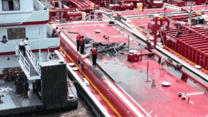 Two people killed after helicopter hits power line and crashes into barge on Mississippi River Two people killed after helicopter hits power line and crashes into barge on Mississippi River