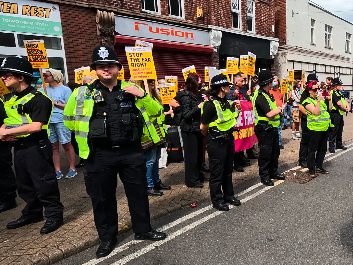 Stand Up to Racism activists gather in opposition to the anti-child rape protest in Nuneaton, England. August 9th, 2025. Oliver Lane, Breitbart News
