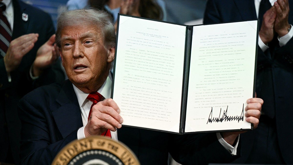 Donald Trump poses