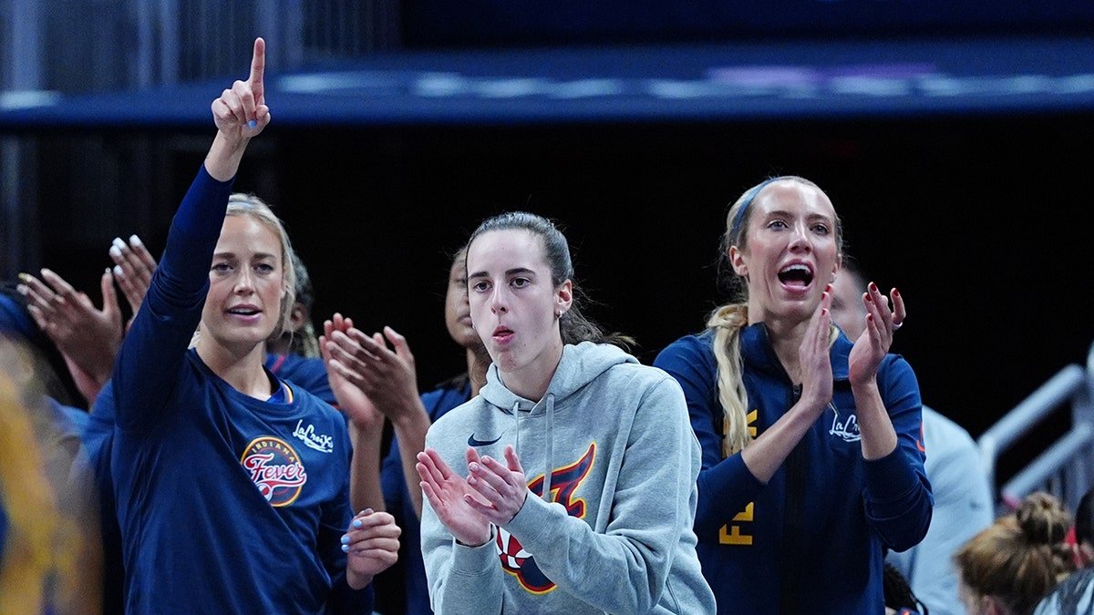 Hull, Clark, and Cunningham cheer