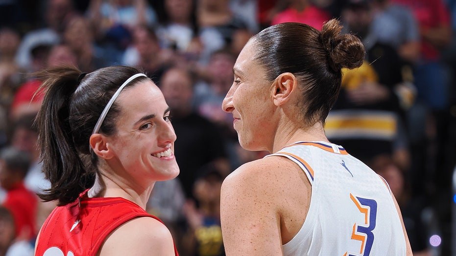 Diana Taurasi and Caitlin Clark during an WNBA game