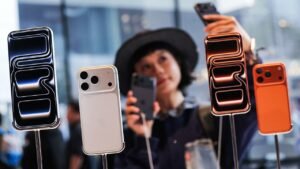Apple’s latest iPhone hits store shelves globally