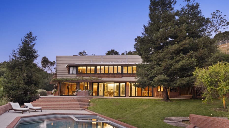 Photo of 14148 Rustic Ln Pacific Palisades exterior of home with pool