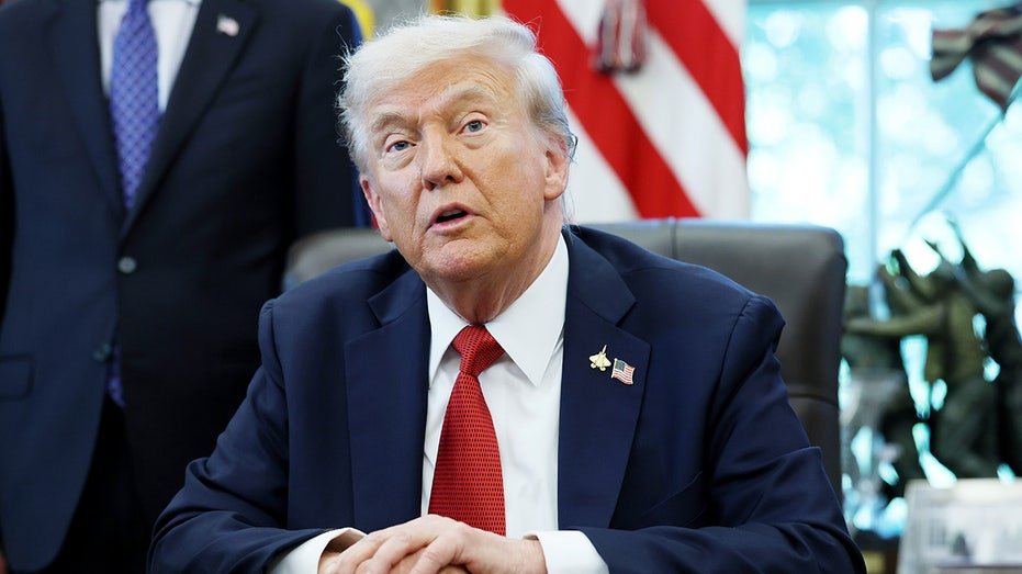 President Trump speaks during an Oval Office signing ceremony.