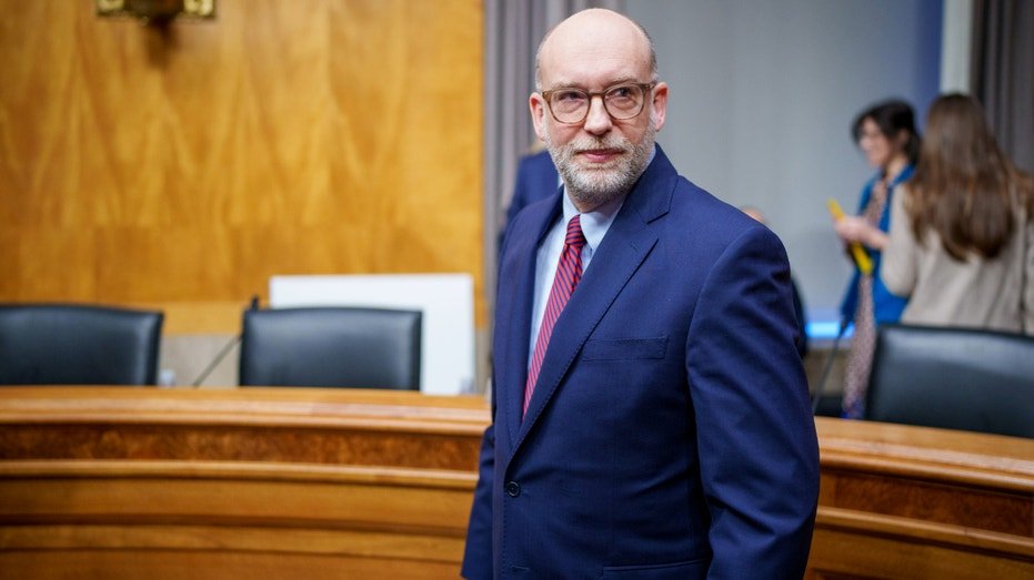 President-elect Donald Trump's nominee for Office of Management and Budget Director Russell Vought arrives for a Senate Homeland Security and Governmental Affairs confirmation hearing on Capitol Hill on Jan. 15, 2025, in Washington, D.C.