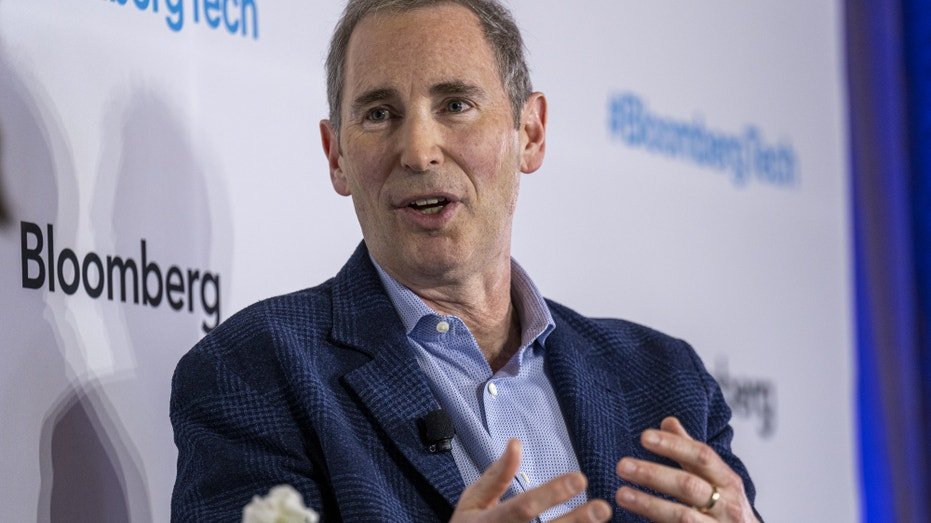 Andy Jassy wearing blue suite speaking
