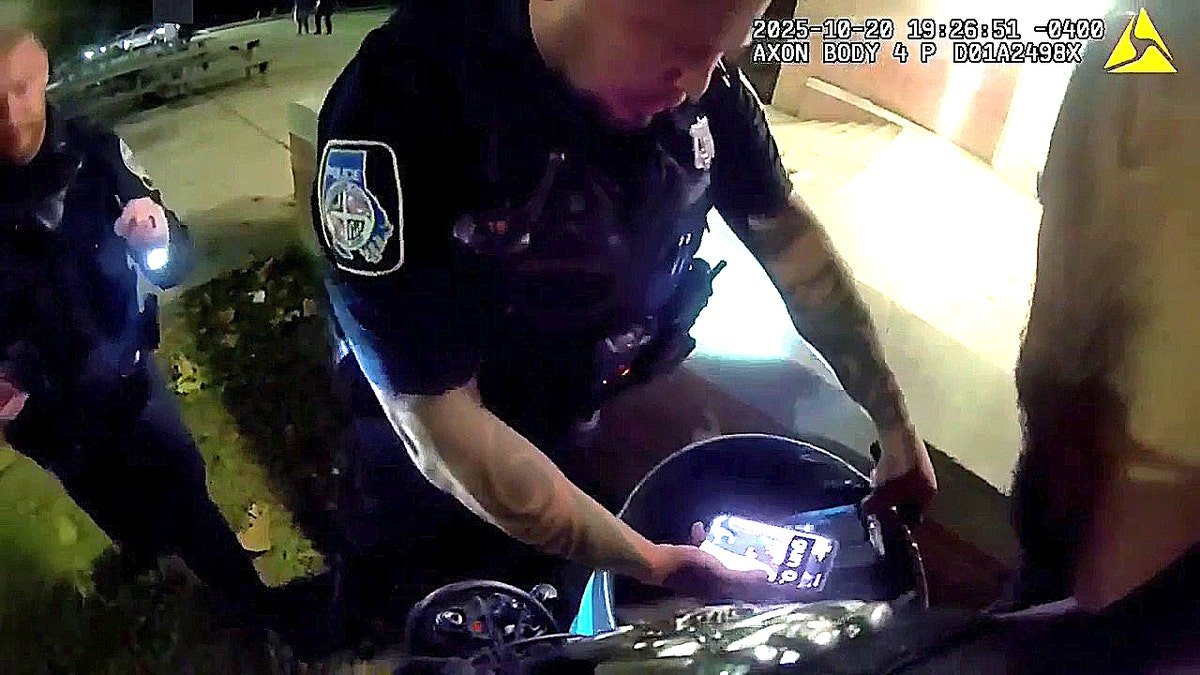 Police find a bag of chips in a trash can.