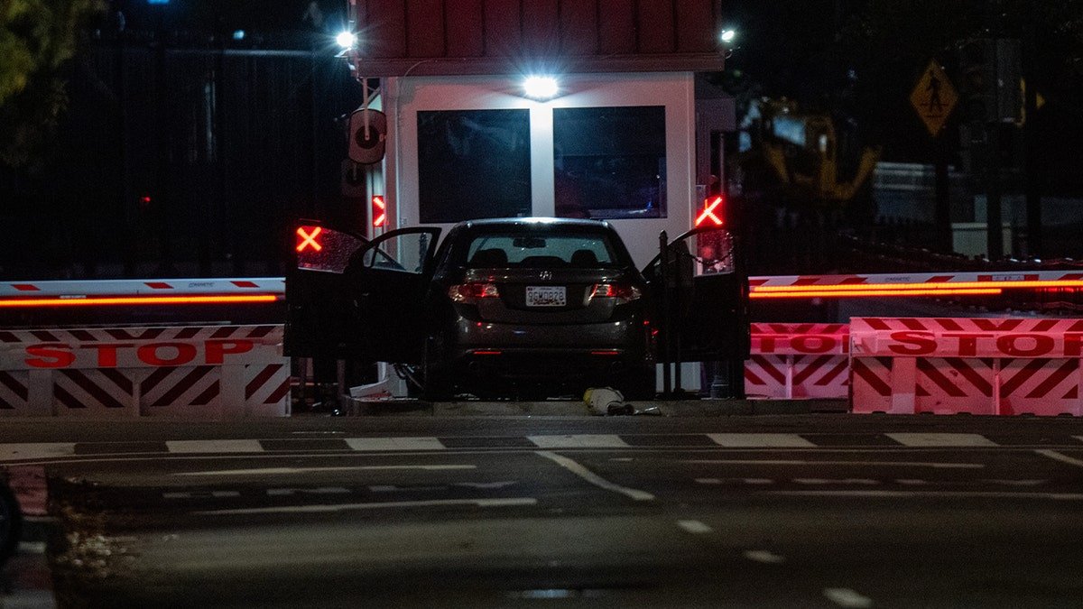 Car runs into White House barricade