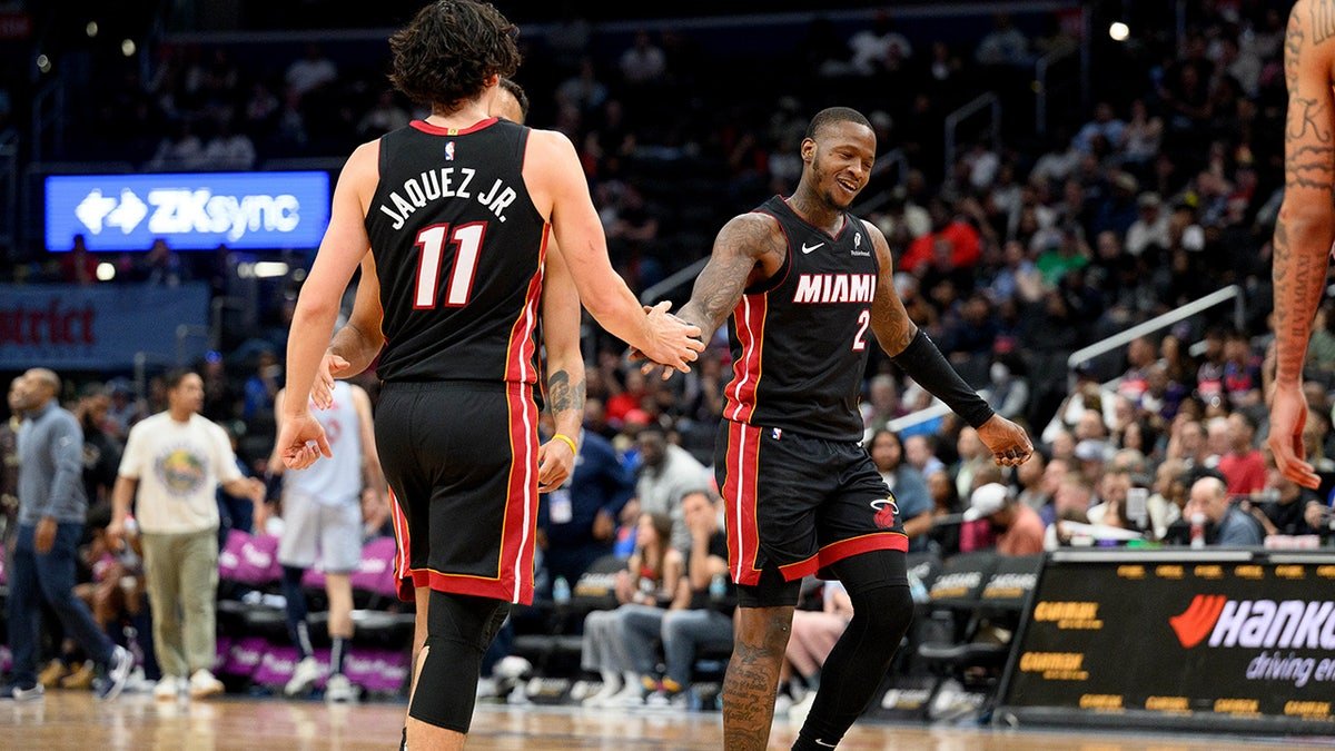 Terry Rozier celebrates with teammate