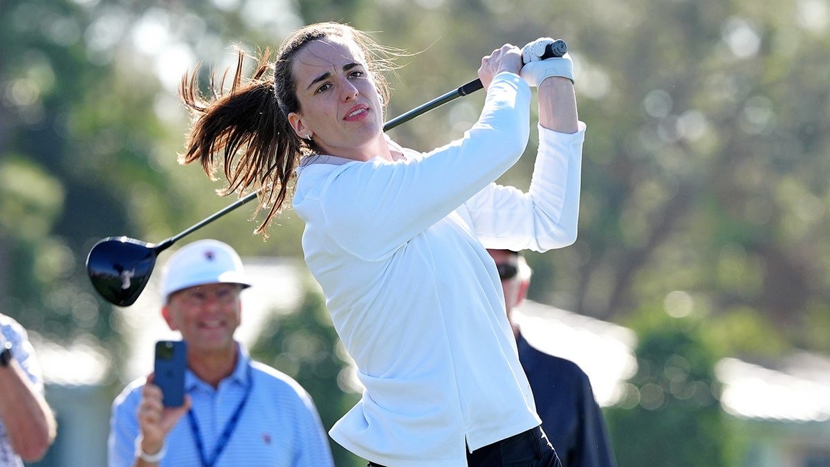 Caitlin Clark plays a tee shot