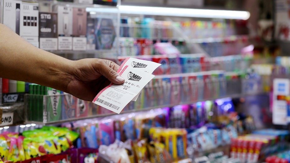 NYC man holds Mega Millions tickets