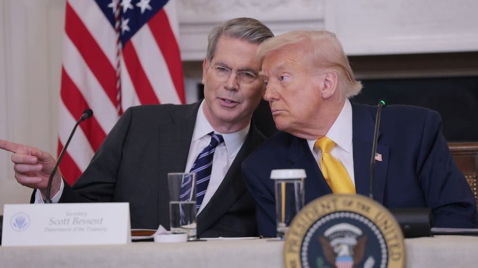 Scott Bessent and Donald Trump at a meeting