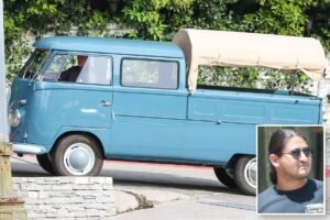 B Powerball winner Edwin Castro spotted cruising LA streets in hippie-mobile