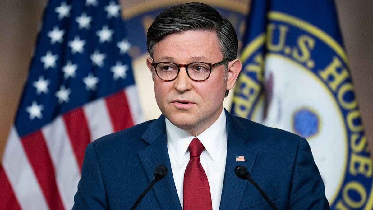 mike johnson at the podium