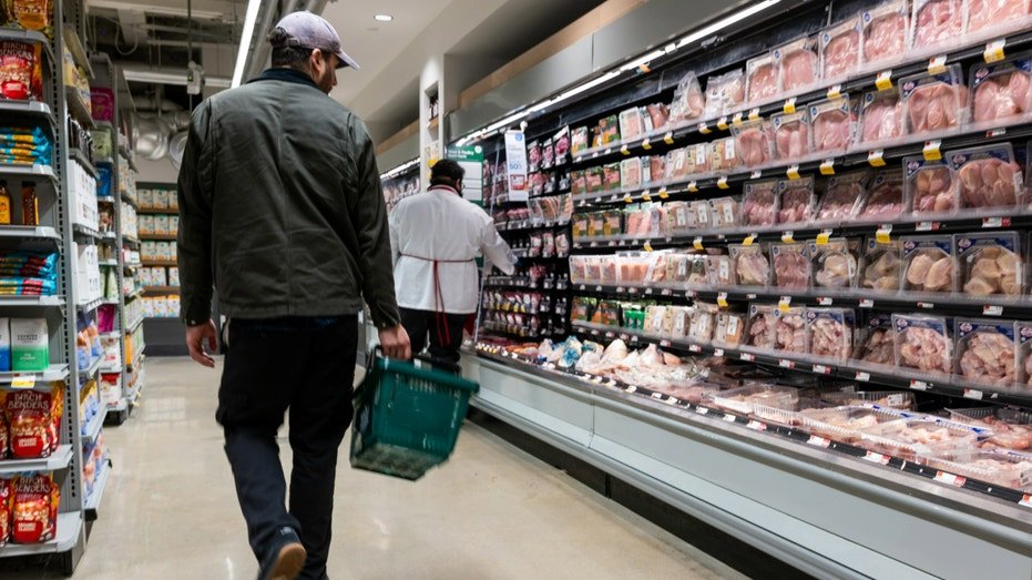 A person shops at a Whole Foods Market grocery store on Dec. 17, 2024, in New York City.