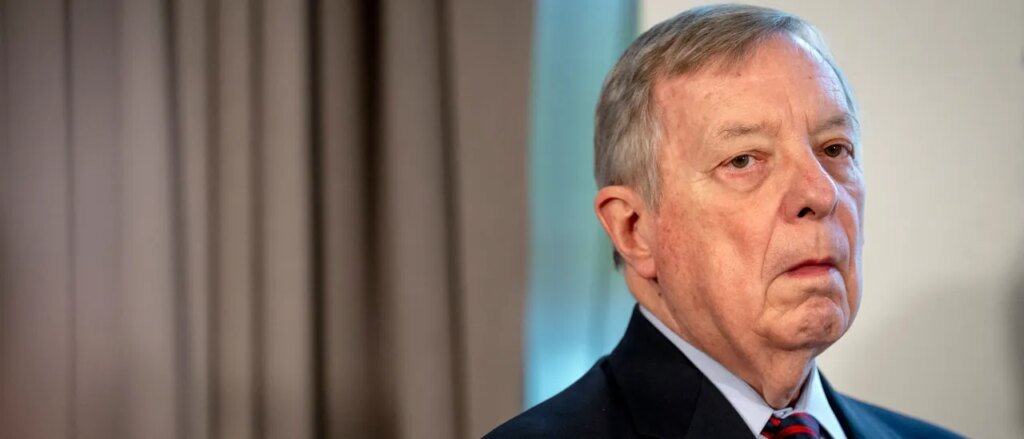 Sen. Dick Durbin Whips Out Poster Of Alex Pretti. Turns Out It’s Fake