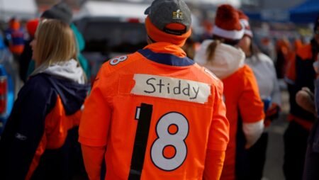 Broncos Fan Knocked Out Cold By Patriots Fan Leaving Mile High After Denver’s Loss: WATCH