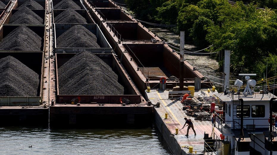 Coal on barges in Pittsburgh, US, on Monday, Sept. 9, 2024. Weekly US coal production was down 13.8% year-to-date for the week ending on August 31 according to the Department of Energy. Photographer: Justin Merriman/Bloomberg via Getty Images
