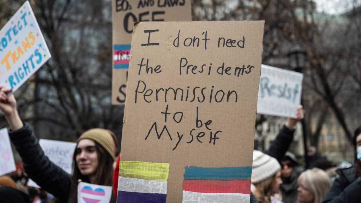 Demonstrators during the Rise Up for Trans Youth rally against President Donald Trump's executive actions targeting transgender people at Union Square in New York, US, on Saturday, Feb. 7, 2025. Three of New York's most prominent hospitals are curbing gender-affirming care for minors after President Donald Trump's executive orders put at risk billions of dollars in federal funding.