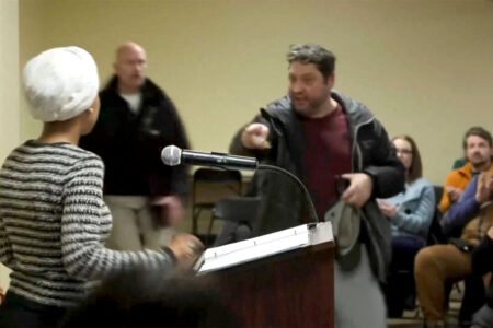 Man Arrested After Spraying Substance on Rep. Ilhan Omar at Town Hall