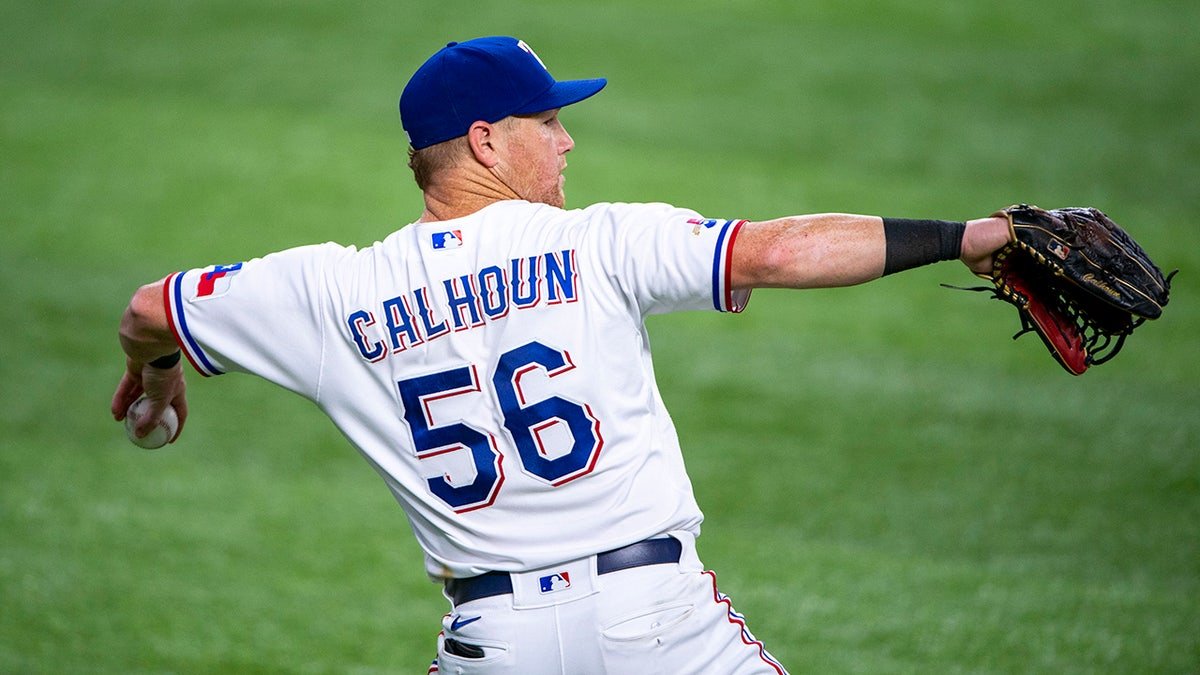 Kole Calhoun throws the ball